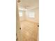 A spacious bedroom with tile flooring and natural lighting, designed for relaxation and functionality at 530 74Th N Ave, St Petersburg, FL 33702