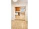 Bright kitchen featuring stainless steel appliances and tiled floors, offering a clean and modern look at 530 74Th N Ave, St Petersburg, FL 33702