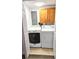 Laundry room with washer, dryer, and storage cabinets at 530 74Th N Ave, St Petersburg, FL 33702