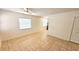 Bright living room features tile flooring, neutral paint, and large window with blinds at 530 74Th N Ave, St Petersburg, FL 33702