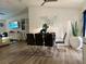 Bright dining area with a glass table, sleek chairs, and modern decor, perfect for entertaining and enjoying meals at 6320 Cedar St Ne, St Petersburg, FL 33702
