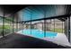 Enclosed pool area with spacious screened-in lanai at 15609 Timberline Dr, Tampa, FL 33624