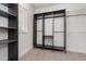 Organized walk-in closet featuring custom shelving and ample storage space at 11314 Grand Park Ave, Riverview, FL 33578