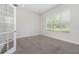 Bright office with a large window and glass-paneled French doors at 11314 Grand Park Ave, Riverview, FL 33578