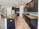Modern kitchen with granite countertops, stainless steel appliances, tile backsplash, and ample cabinet space at 19491 Paddock View Dr, Tampa, FL 33647