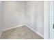Small tiled room with electrical outlets offering potential for storage or utility space at 19491 Paddock View Dr, Tampa, FL 33647