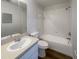 Clean bathroom featuring a standard bathtub and a single sink vanity at 9855 Morris Glen Way, Temple Terrace, FL 33637