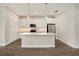 Modern kitchen with stainless steel appliances and a center island at 9955 Patrician Dr, New Port Richey, FL 34655