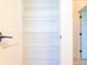 White closet with built-in wire shelving for optimal organization at 14073 Naylor Ave, Port Charlotte, FL 33981