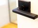 Close-up of modern black door handle at 14073 Naylor Ave, Port Charlotte, FL 33981