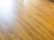 Attractive hardwood style flooring laid out horizontally to create warmth and texture within the home at 14073 Naylor Ave, Port Charlotte, FL 33981