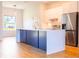 Kitchen view of an island with a white countertop, stainless steel appliances, and pendant lighting at 14073 Naylor Ave, Port Charlotte, FL 33981