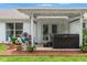 Cozy covered patio with hot tub and string lights, perfect for relaxing at 15364 Mount Sparrow Rd, Weeki Wachee, FL 34614