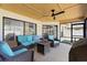 Comfortable screened patio with nice seating and a ceiling fan makes for great outdoor living at 2556 Arborwood Dr, Valrico, FL 33596