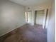 Bedroom features carpeting, closet and white trim at 8035 Robin Rd, Seminole, FL 33777