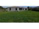 Large grassy backyard at 1140 Belmar Ave, Port Charlotte, FL 33948