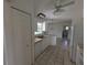Bright kitchen with white cabinetry and appliances, providing ample space for cooking and storage at 1140 Belmar Ave, Port Charlotte, FL 33948