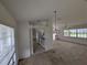 Open living room and kitchen layout, providing a spacious living and cooking area at 1140 Belmar Ave, Port Charlotte, FL 33948