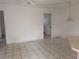 Living room with tile floors at 1140 Belmar Ave, Port Charlotte, FL 33948