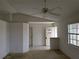 Spacious living room featuring an open layout and a large window view at 1140 Belmar Ave, Port Charlotte, FL 33948