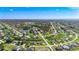 Enjoy an elevated perspective of this residential neighborhood with its well-kept landscaping and canals at 142 Broadmoor Ln, Rotonda West, FL 33947