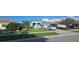 Charming one-story home featuring a well-manicured lawn, inviting curb appeal, and a two-car garage at 1884 Coconut Palm Cir, North Port, FL 34288