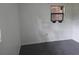 Bedroom with carpet flooring and a window offering natural light at 2308 18Th E St, Bradenton, FL 34208