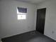 Bedroom with neutral carpet, a window with coverings, and spacious layout at 2308 18Th E St, Bradenton, FL 34208