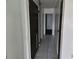 Hallway with tile flooring and closet at 2308 18Th E St, Bradenton, FL 34208