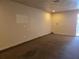 Spacious living room features neutral carpet, light-colored walls, and ample room for furnishings at 2308 18Th E St, Bradenton, FL 34208