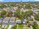 Aerial view of a single Gathering residence with mature trees near downtown, with an outlined property boundary at 2710 W North A St, Tampa, FL 33609