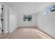 Bedroom featuring natural light with outside views coming through the windows at 1740 Lucas Dr, Clearwater, FL 33759