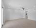 Spacious bedroom with recessed lighting and access to a hallway at 1740 Lucas Dr, Clearwater, FL 33759