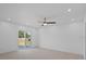 Bright bedroom featuring modern ceiling fan and recessed lighting at 1740 Lucas Dr, Clearwater, FL 33759