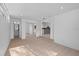 Spacious living room with bright lighting and doorways to other rooms in the home at 1740 Lucas Dr, Clearwater, FL 33759