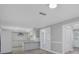 Bright, modern kitchen with an island featuring unique accents and stainless steel appliances at 1937 N Highland Ave, Clearwater, FL 33755