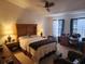 Cozy main bedroom featuring neutral colors, carpeted floors and a ceiling fan at 2247 Golden Oak Ln, Valrico, FL 33594