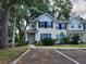 Inviting two-story townhome with well-maintained landscaping, sidewalk and parking at 2247 Golden Oak Ln, Valrico, FL 33594