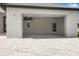 Spacious two car garage with finished walls, and ceiling at 27 Bunker Ct, Rotonda West, FL 33947
