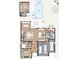 Detailed floor plan of the first floor featuring the living spaces, kitchen, garage, and office at 4013 W Inman Ave, Tampa, FL 33609