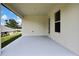 Covered patio with ample space for outdoor seating and entertaining at 9739 Loretto St, Spring Hill, FL 34608