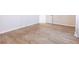 Bright bedroom featuring wood-look tile flooring and neutral walls at 1049 Presque Isle Dr, Port Charlotte, FL 33952