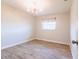 Bright bedroom with a window, and tile flooring at 1049 Presque Isle Dr, Port Charlotte, FL 33952