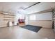 Spacious garage area including washer and dryer, countertop, utility sink and work area at 1049 Presque Isle Dr, Port Charlotte, FL 33952