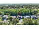 Aerial shot of a lovely residential home with lush green surroundings and manicured landscaping at 4404 Grainary Ave, Tampa, FL 33624
