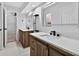 Bright bathroom featuring double sink vanity with white countertop and modern fixtures at 4404 Grainary Ave, Tampa, FL 33624