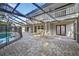 Sparkling pool with a screened lanai offers privacy and outdoor enjoyment at 4404 Grainary Ave, Tampa, FL 33624