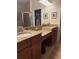 Bathroom featuring double vanity, granite countertops, and lots of space at 4926 Anniston Cir, Tampa, FL 33647