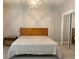 Neutral bedroom with a large closet and unique light fixture at 4926 Anniston Cir, Tampa, FL 33647
