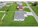 Birds eye view of home showing back yard and AC unit at 3323 Elkcam Blvd, Port Charlotte, FL 33952